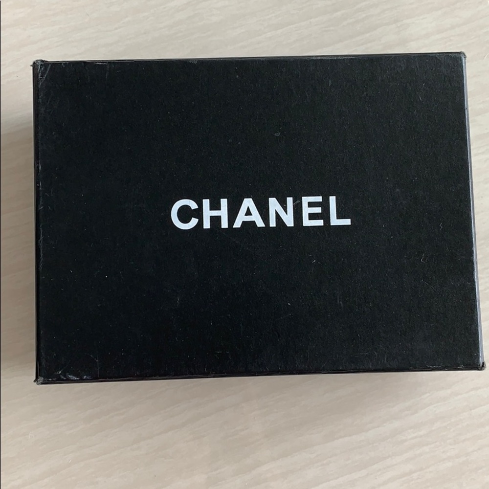 Empty Chanel box with dust bag